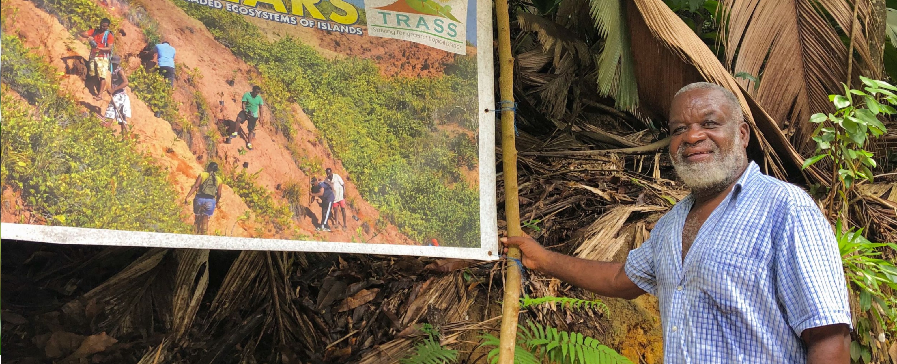 Victor with project sign